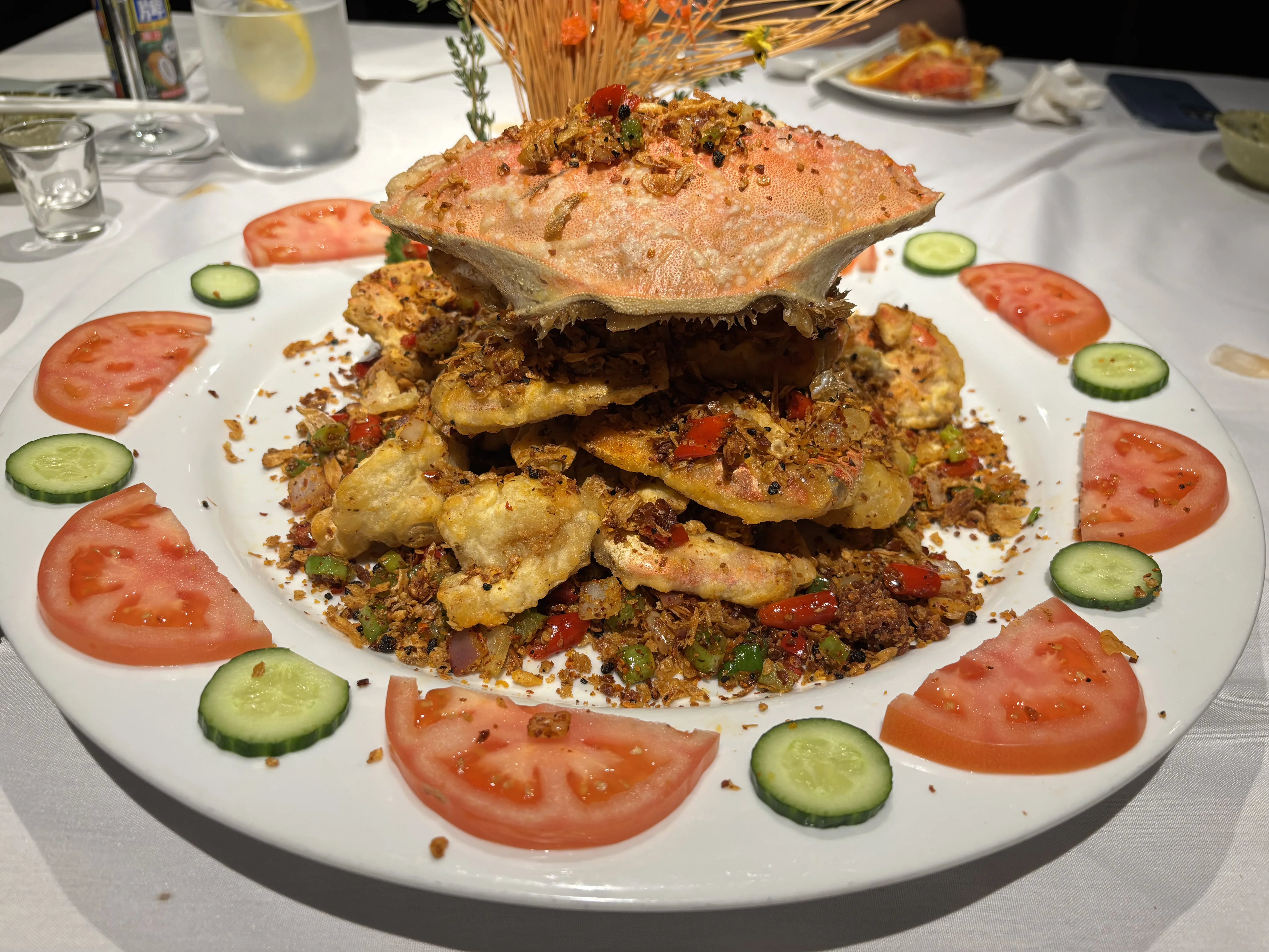 Crab tower with tomato and cucumber garnish