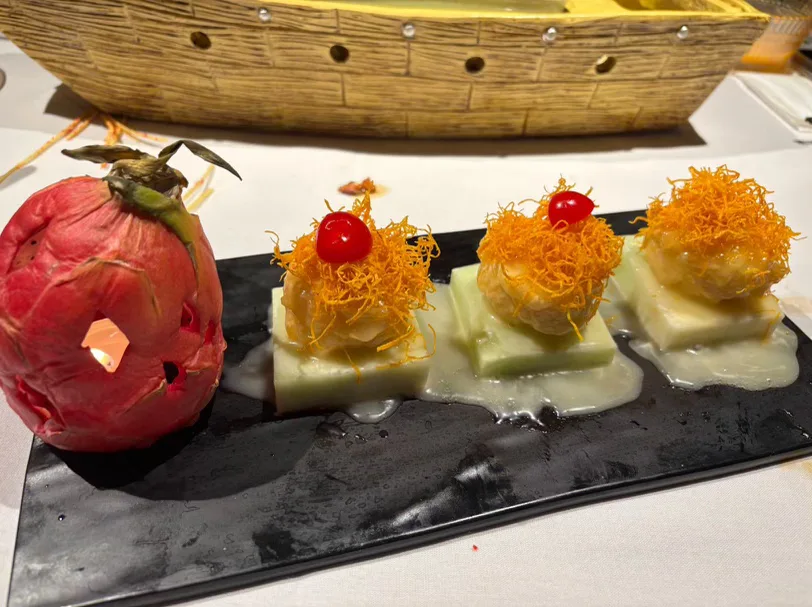 Chef's tasting plate with dragon fruit lantern
