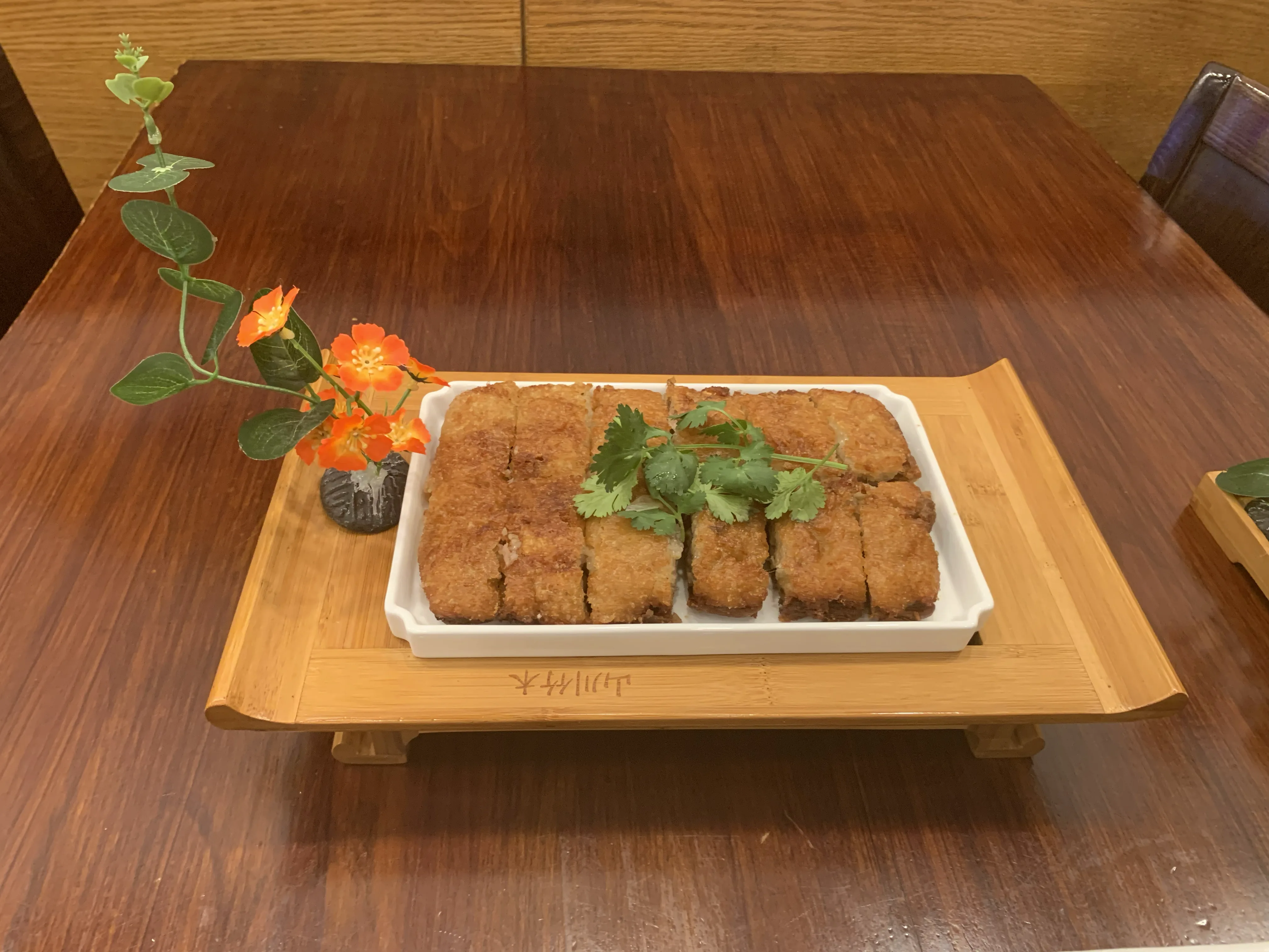 Crispy fried pork strips with cilantro